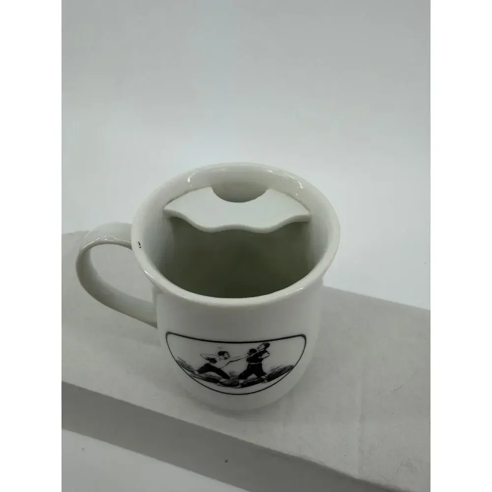 Porcelain coffee mug, Victoriana Collection The Strongman